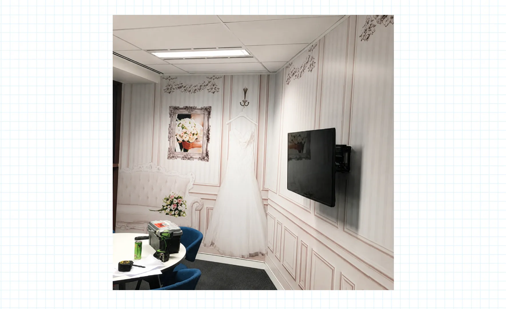 Inside an office meeting room with decals as if you are in a bridal dressing room